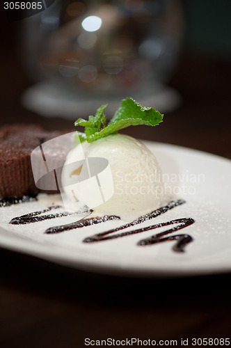 Image of chocolate cake with ice cream