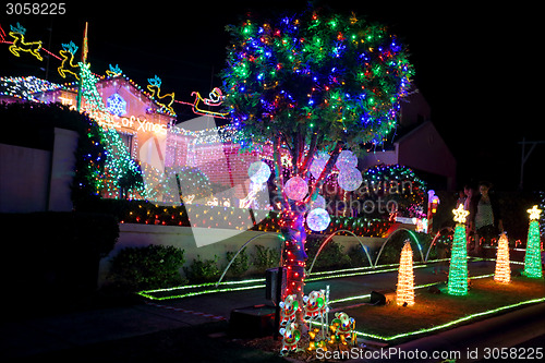 Image of Christmas Lights Decorations on suburban house for charity