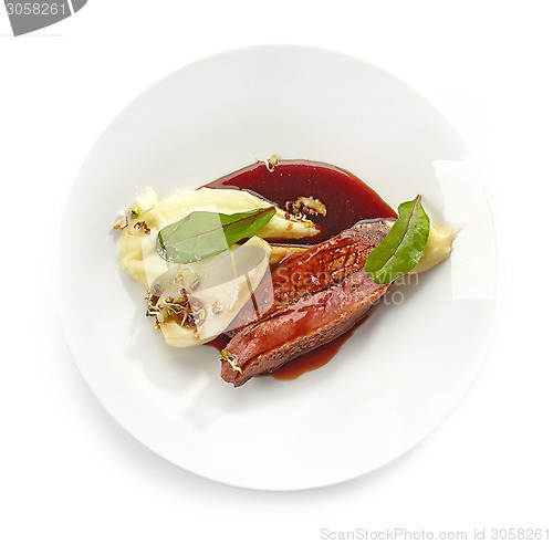 Image of Plate of duck breast and mashed potatoes