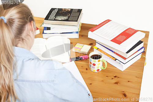 Image of girl making homework