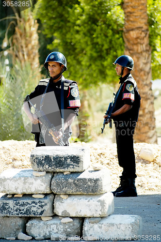 Image of Egyptian Police Officers stand on post