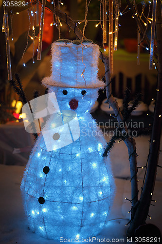 Image of Snowman snow Christmas display with twinkling lights wonderland