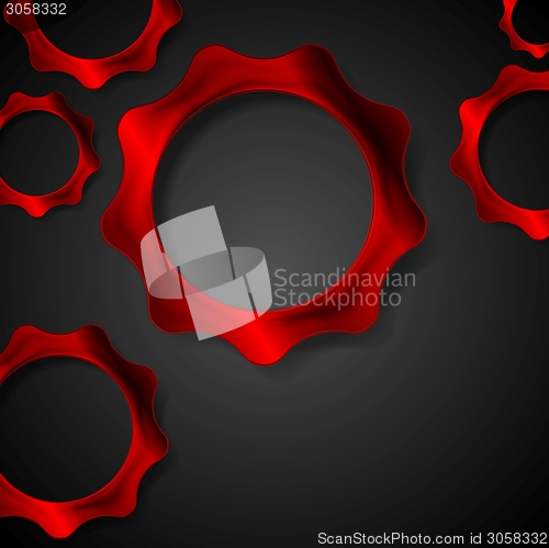 Image of Red metal gears on black background