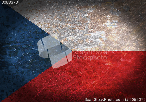 Image of Old rusty metal sign with a flag