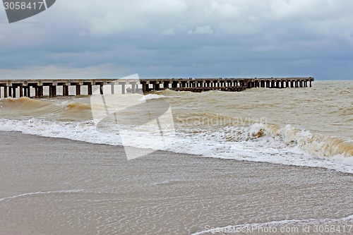 Image of Old pier in stormy weather