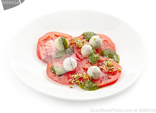 Image of Plate of tomato and goat cheese balls salad