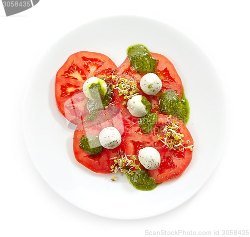 Image of Plate of tomato and goat cheese balls salad