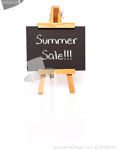 Image of Summer Sale. Blackboard with text and easel.