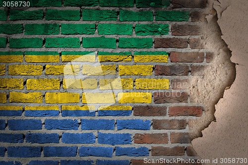 Image of Dark brick wall with plaster - Gabon