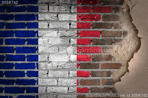 Image of Dark brick wall with plaster - France