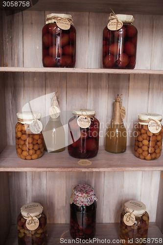 Image of Jars with sweet fruits