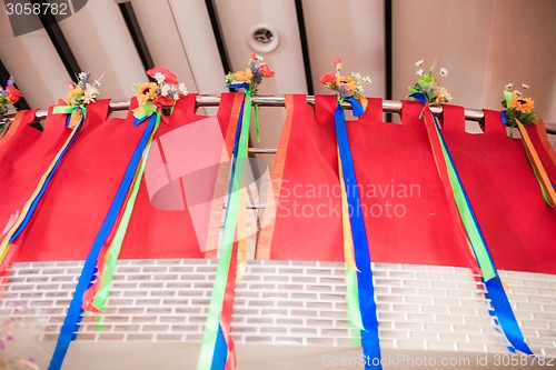 Image of Bouquets with stripes hanging on wall