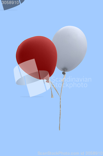 Image of red and white balloon