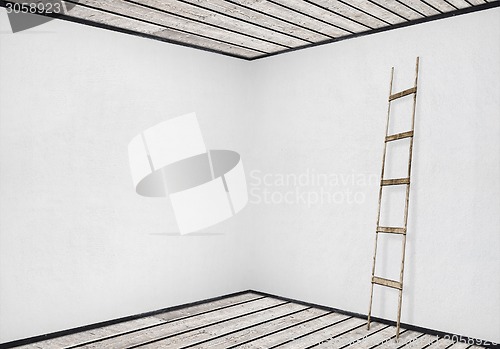 Image of white wall with a wooden ladder