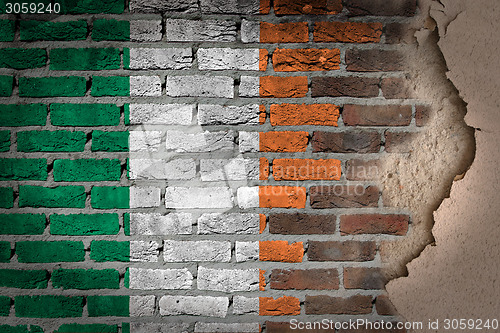 Image of Dark brick wall with plaster - Ireland