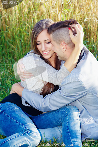 Image of Happy smiling young couple outdoor. valentine concept