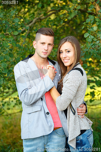Image of Happy smiling young couple outdoor. valentine concept