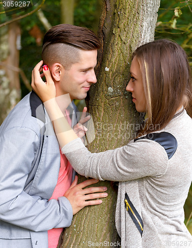 Image of Happy smiling young couple outdoor. valentine concept