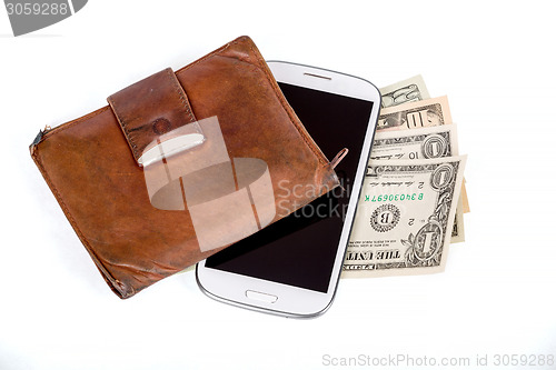 Image of cellphone and money on white