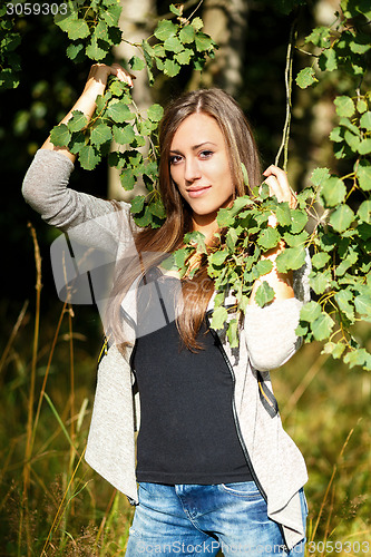 Image of Portrait of a charming lady woman girl outdoor