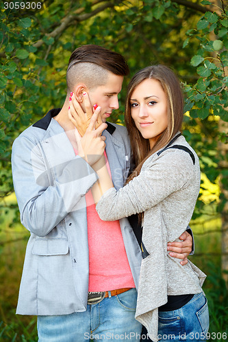 Image of Happy smiling young couple outdoor. valentine concept