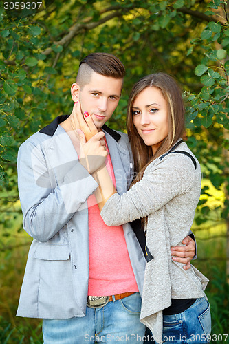 Image of Happy smiling young couple outdoor. valentine concept