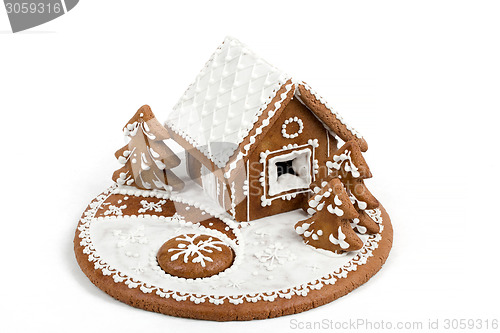 Image of Holiday Gingerbread house isolated on white. 