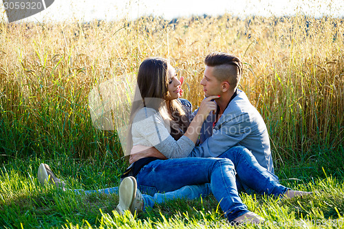 Image of Happy smiling young couple outdoor. valentine concept