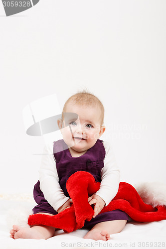 Image of Child girl with Christmas santa hat