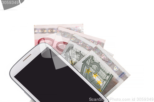 Image of cellphone and money on white