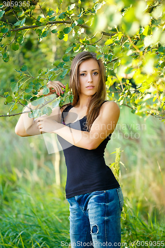 Image of Portrait of a charming lady woman girl outdoor