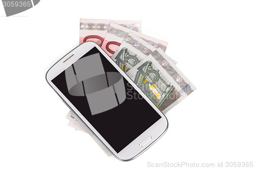 Image of cellphone and money on white