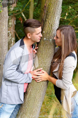Image of Happy smiling young couple outdoor. valentine concept