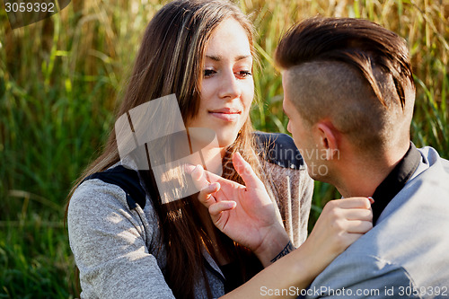 Image of Happy smiling young couple outdoor. valentine concept