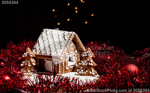 Image of Holiday Gingerbread house on dark background