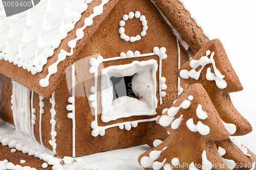Image of Holiday Gingerbread house isolated on white. 
