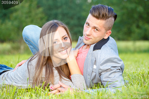 Image of Happy smiling young couple outdoor. valentine concept