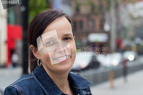 Image of Casual woman portrait on the street