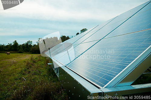 Image of Solar energy panels in a farmer's field