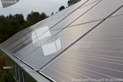 Image of Solar energy panels in a farmer's field