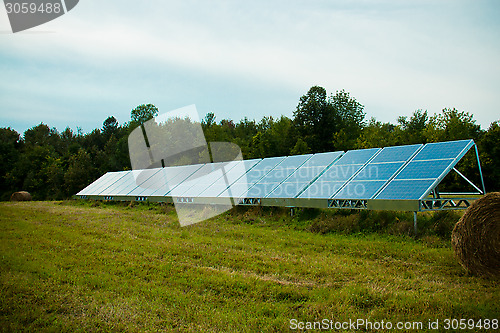 Image of Solar energy panels in a farmer's field