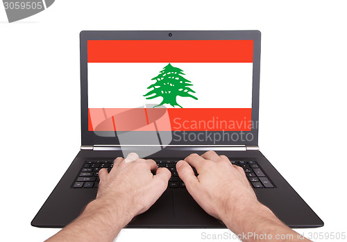 Image of Hands working on laptop, Lebanon