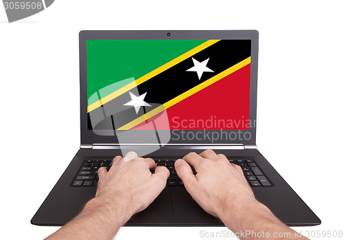 Image of Hands working on laptop, Vanuatu