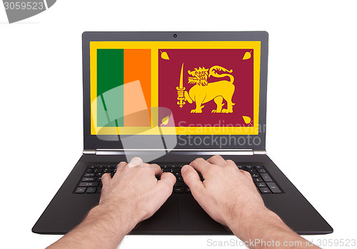 Image of Hands working on laptop, Sri Lanka