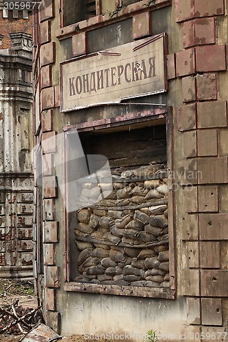 Image of  War window laid down sand bags