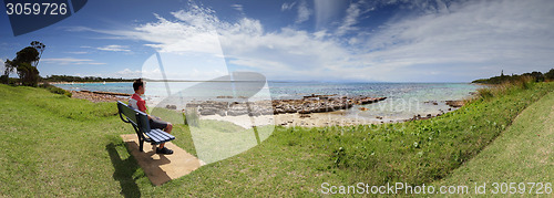 Image of Tourist visitor admiring the views Currarong Beach Australia
