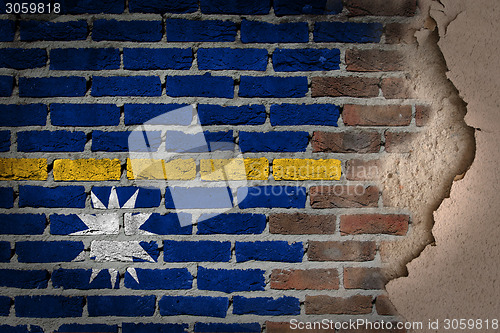 Image of Dark brick wall with plaster - Nauru