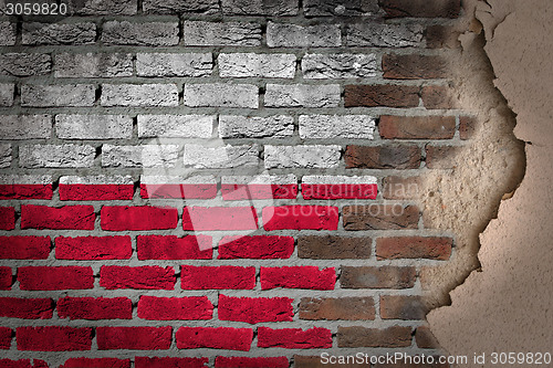 Image of Dark brick wall with plaster - Poland