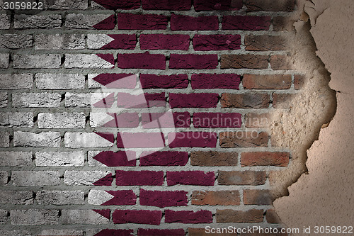 Image of Dark brick wall with plaster - Qatar