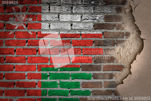 Image of Dark brick wall with plaster - Oman